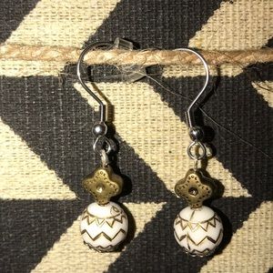 Gold and white earrings